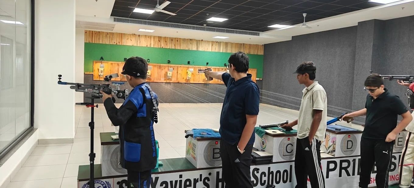 Indoor shooting range with students at the firing points. Not the Sector 92 project.